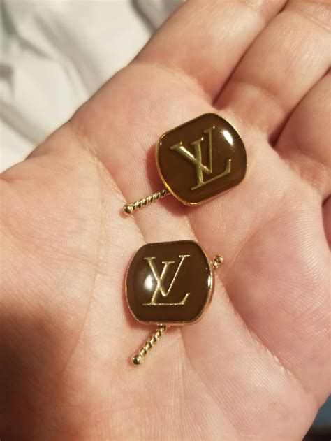 lv cufflinks gold.